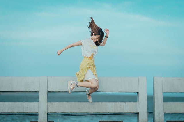 jumpshot-photography-of-woman-in-white-and-yellow-dress-near-884977-1