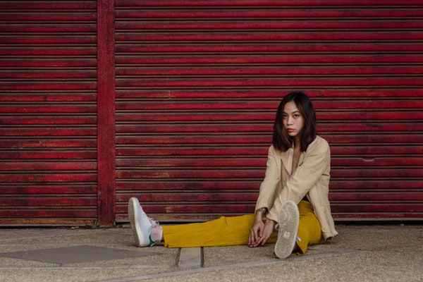 photo-of-woman-sitting-on-the-floor-3688136