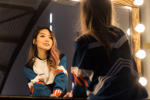 woman-wearing-blue-and-white-sweatshirt-2471415