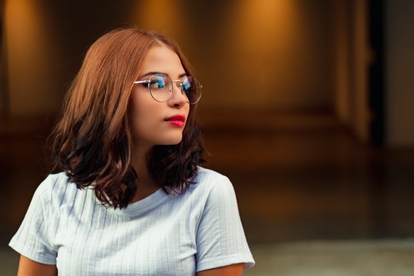 woman-wearing-eyeglasses-looking-at-the-side-2528785