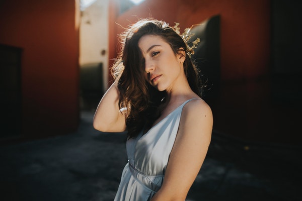 woman-wearing-white-spaghetti-strap-dress-2448750